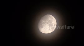 Shining 'halo' visible around moon, possibly signifying change in weather