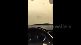 Driver's visibility gets completely restricted by crazy dust storm in Southern California