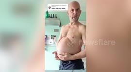 Man earns thousands a year by selling 'male pregnancy' videos on OnlyFans by pushing out his belly