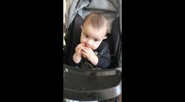 Baby enjoying a chocolate cookie for the first time!