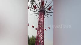 Tourists left hanging in the air after theme park ride malfunctions in China
