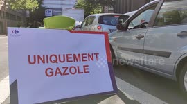 The shortage of fuel generates a strong influence at gas stations. Agents are obliged to manage traffic as well as security. Paris suburb of Ivry-sur-Seine, Val-de-Marne, Carrefour station, rue Westermeyer. 7 oct 2022. 13h00 pm.