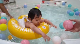 Adorable baby floating in water is the cutest thing ever