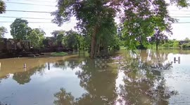 Buddhist temple ruins submerged in flood after Typhoon Noru ravaged Thailand