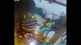Irresponsible man points gun at friend's head for a selfie in Houston, Texas