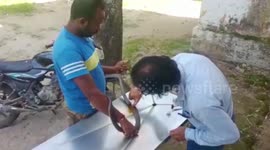 Rescued cobra receives treatment at vet hospital in central India