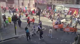 Protesters march through London protesting climate change and over use of fossil fuels