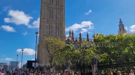 Protesters gathered to form a human chain around Parliament for Julian Assange