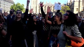 Anti Iranian demonstrations continue  in central London , crowds protest in parliament square .