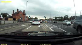 Dashcam footage captures moment Honda hits Cooper on a junction in Oldham, Greater Manchester