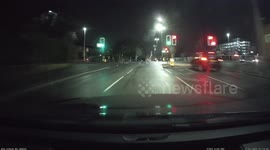 Dashcam footage captures moment man on bicycle crosses the road on red light in Salford