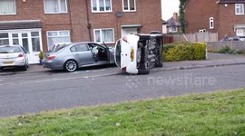 Dashcam footage captures moment BMW speeding and crashes into parked cars in Wythenshawe, Manchester