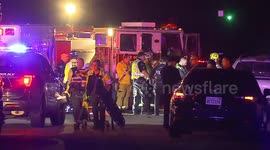 Drunk driver crashes into parked Pickup injuring one child and possibly killing two pedestrians