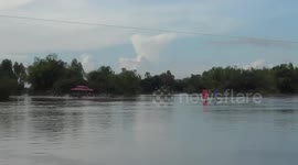 Three oarsmen missing after boat capsizes during longboat race in Thailand