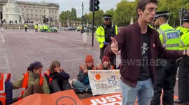 Just Stop Oil activists block The Mall near Buckingham Palace