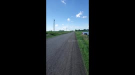 Beginner dirtbike rider crashes after botched wheelie attempt