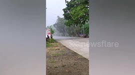 Residents baffled by rain pouring on one side of road while the rest stays dry