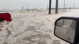Raging icy floodwater inundates roads in Fort Stockton, US