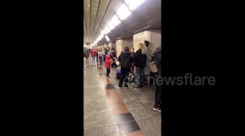Ukraine: People Sheltering In Subway Stations Sing Amid Russian Missile Attack In Kyiv 2