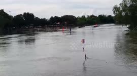 Oarsmen thrown overboard after hitting bridge during boat race in Thailand