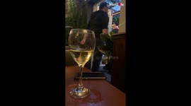 'Best seat in the house!' - Woman watches as bargoers keep tripping over door frame