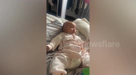Food coma! Baby instantly falls asleep after spoonful of cereal