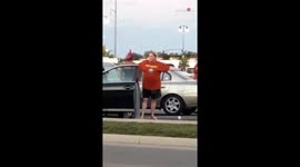 Comical verbal altercation in Walmart parking lot caught on camera
