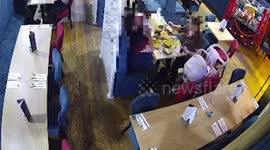 Video apparently shows female dinner 'planting' piece of plastic in her food to avoid £170 bill