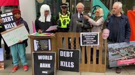 Cancel the debt for climate justice protest outside World Bank