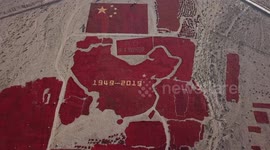 Red Chilies Field Forms The National Flag And Map Of China In Zhangye City