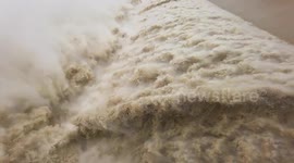 Flood Discharge from Yutan Hydropower Station In Qianjiang District, China