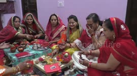 Hindu married women perform rituals on Karwa Chauth festival in India