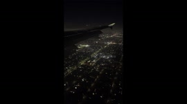 Sunset flight into Los Angeles, LAX with view of NEW Sofi Stadium, The Forum, Hollywood Park in Inglewood
