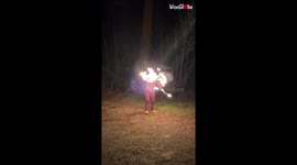 Man throws fear out of the window while performing a CRAZY double fire staff routine