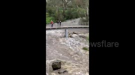 Kayakers make most of raging torrent amid floods in Australia's Victoria