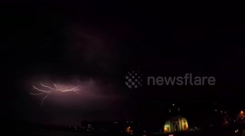Early morning/night time forked lightning  over St Juliens Bay Mata