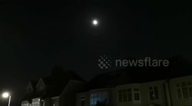 The Moon high in the sky with Mars below the moon