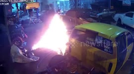 Terrifying video of moment a motorbike repair turns into ball of flame in Thai garage