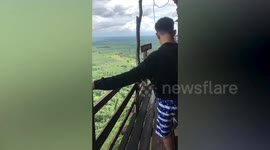 Terrifying vertiginous wooden bridge offers stunning view of northeast Thailand