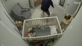Baby falls off change table and is caught by quick-reacting dad