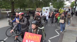 Cyclists protest Shell partnership with British Cycling outside oil giant's London HQ