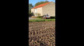 BMW rally car slides off the road and almost into a building during race in Belgium