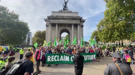 Thousands join Extinction Rebellion's Reclaim Our Future march through central London