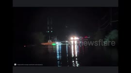 Dramatic Rescue of Two Men Trapped on top of they’re Truck during a Flash Flood