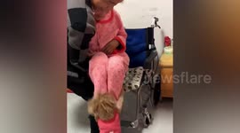 Pet dog attempts to help owner carry his paralysed mother onto bed
