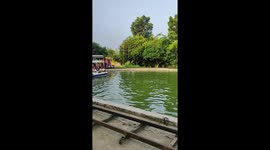 Cute Kids are Having fun on Boat and Train in Children's Park