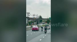 Daredevil rider arrested over reckless stunts on busy highway in Thailand