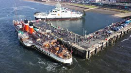 Paddle Steamer Waverley at Largs pier on last trip of 2022 (Sunday 16th October) view of hundreds of passengers boarding,