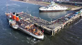 Paddle Steamer Waverley at Largs pier on last trip of 2022 (Sunday 16th October) view of hundreds of passengers boarding,
