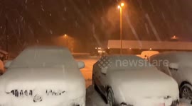 Cars buried in snow as winter storm approaches Michigan, US